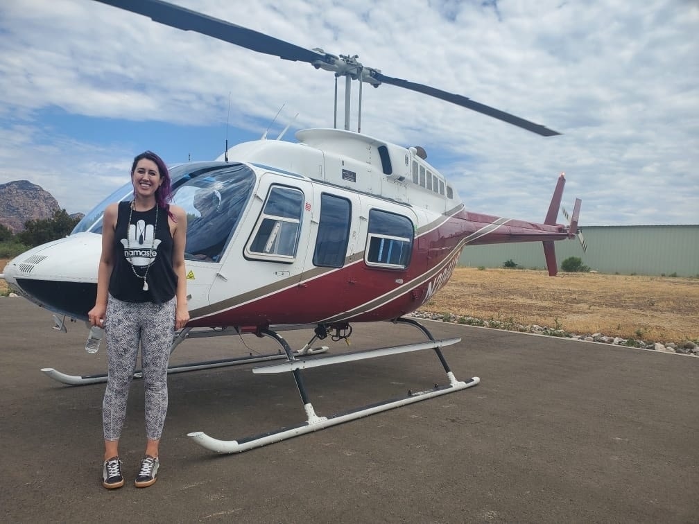 transform with chelsea - hypnotist in front of a helicopter